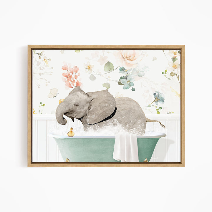 A gray elephant is taking a bath in a green tub, surrounded by pink and white flowers.