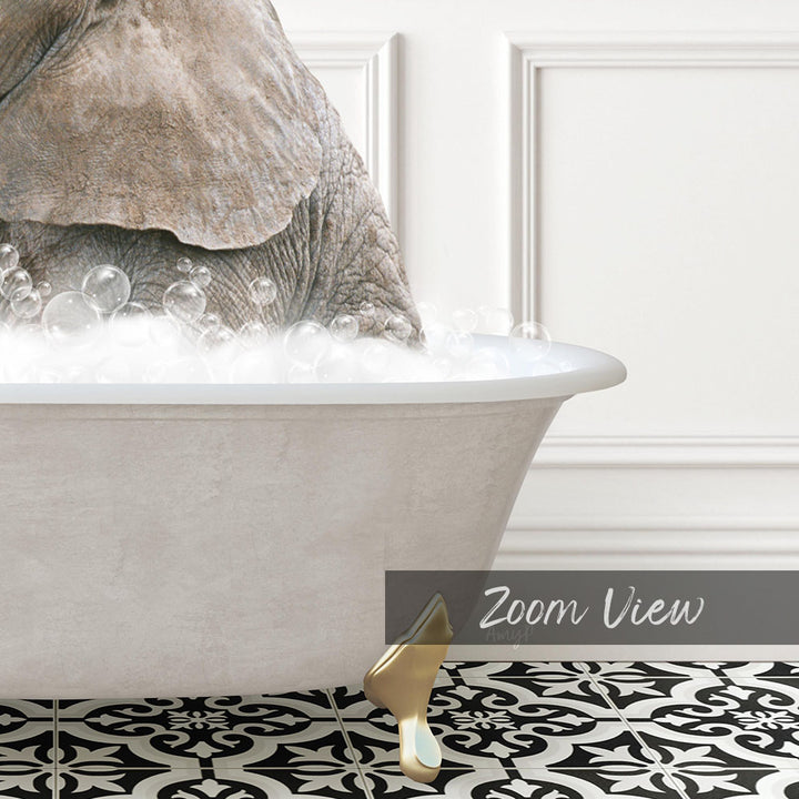 A large elephant is sitting in a bathtub filled with bubbles, creating a whimsical and playful scene.