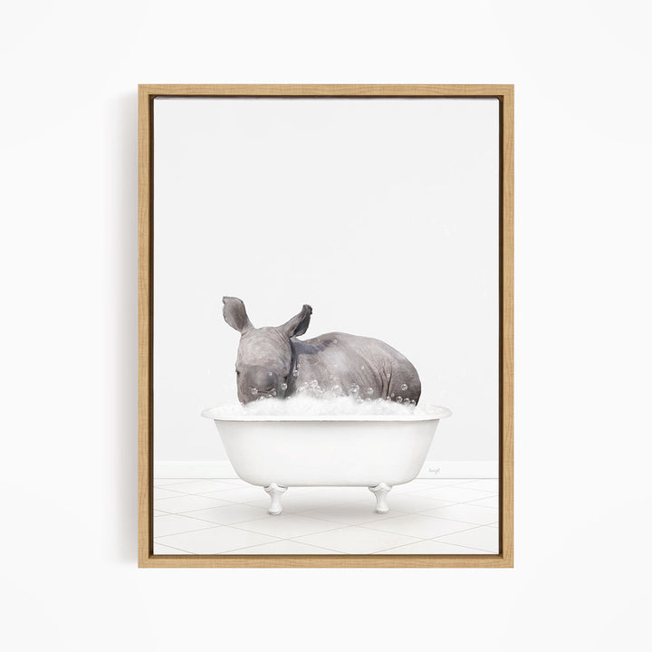A rhinoceros is sitting in a white bathtub filled with water, creating a whimsical and playful scene.