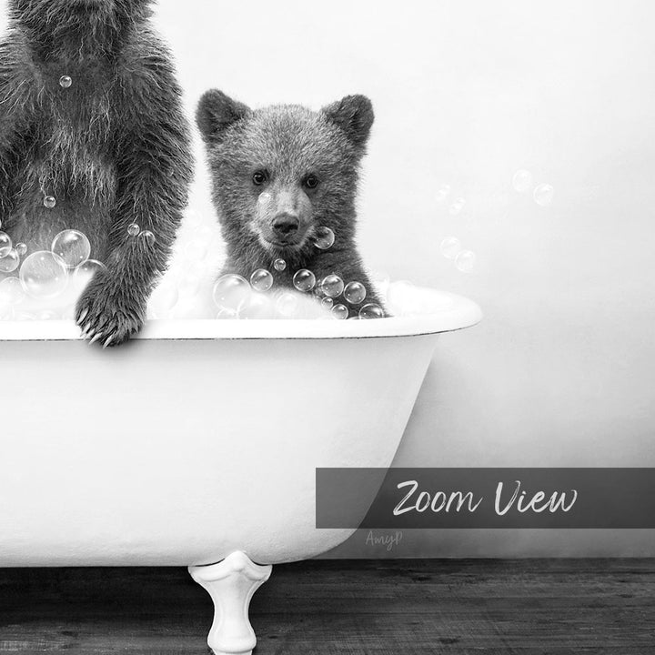 A black and white image showing two bears sitting in a bathtub filled with bubbles, with the word "Zoom View" written below the image.
