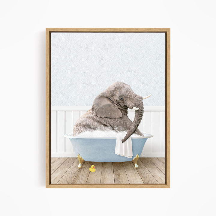 A gray elephant is sitting in a blue bathtub filled with water, surrounded by yellow rubber ducks.