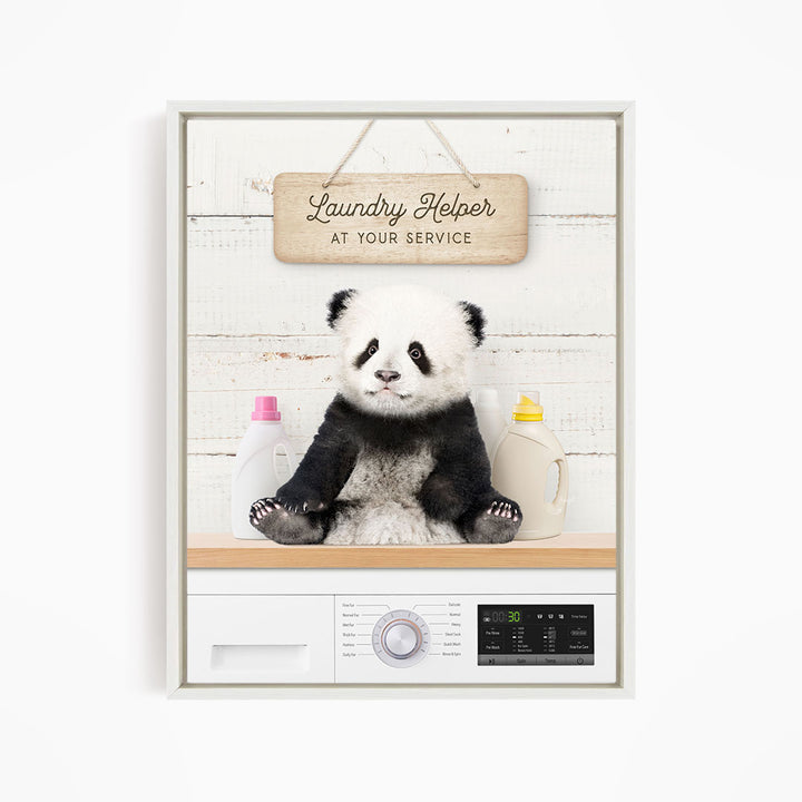 A panda bear sitting on a shelf next to laundry supplies, with a sign that says "Laundry Helper at your service".