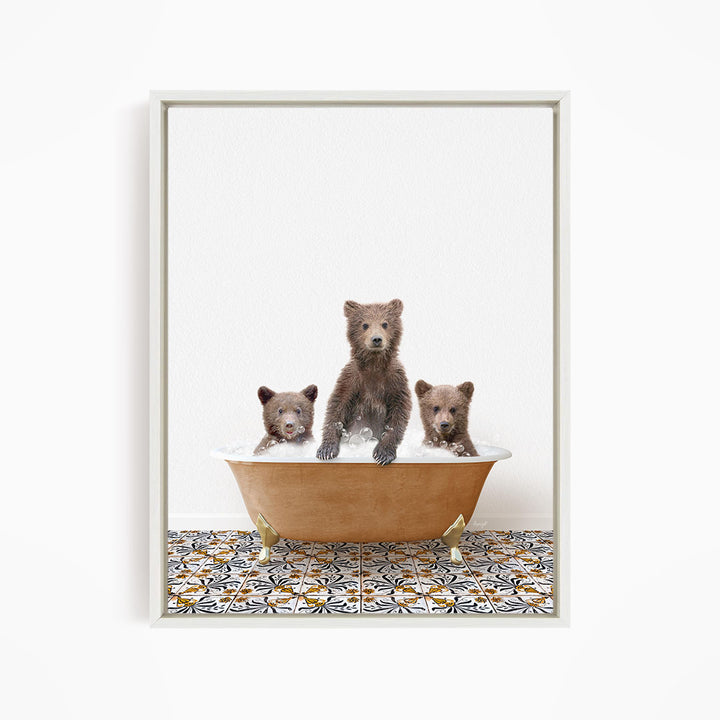 Three adorable brown bears sitting in a bathtub filled with water, creating a playful and whimsical scene.