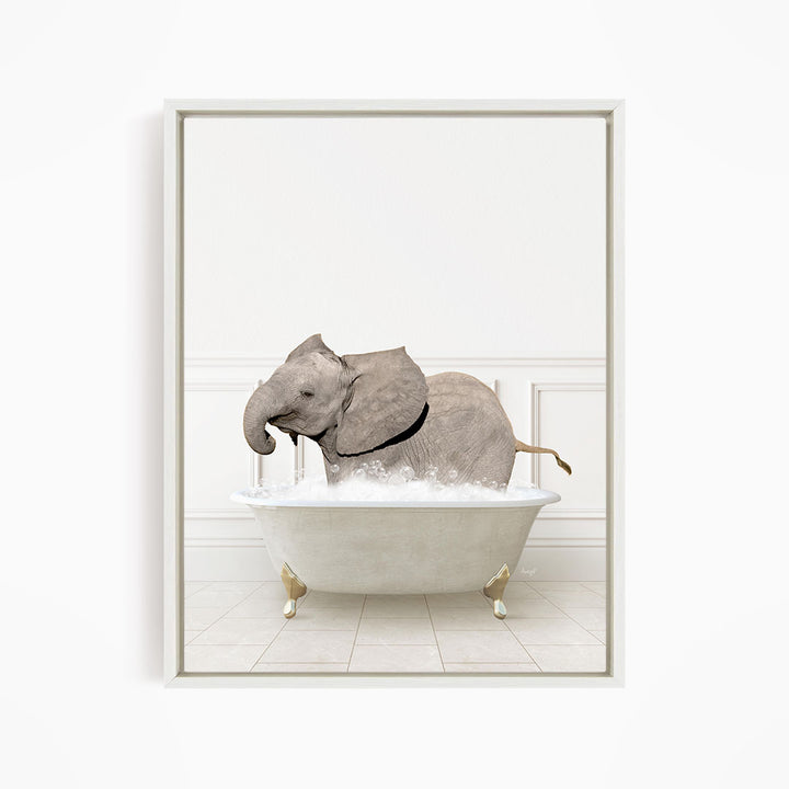 A gray elephant is sitting in a white bathtub filled with water, creating a whimsical and playful scene.