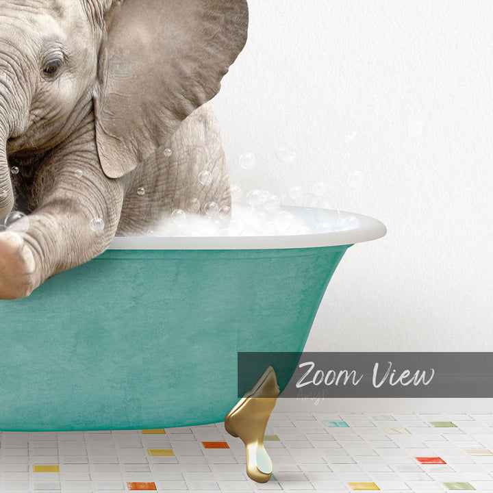 A baby elephant sitting in a green bathtub filled with bubbles, with a text overlay that reads "Zoom View".