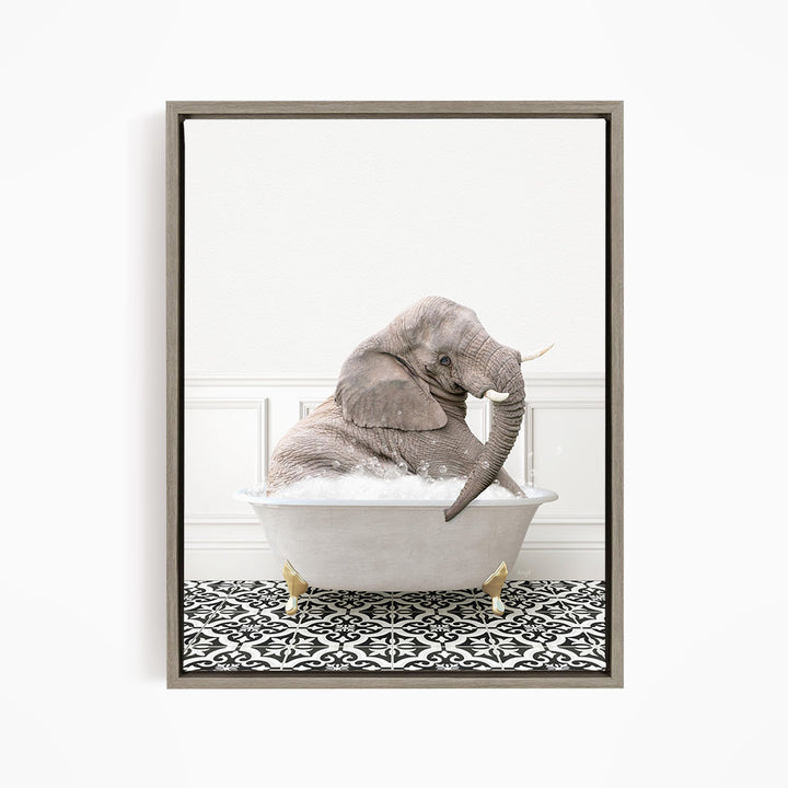 A gray elephant sitting in a white bathtub filled with water, surrounded by a black and white patterned floor.