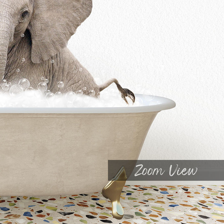 A large elephant is taking a bath in a bathtub filled with bubbles, with its foot in the water.