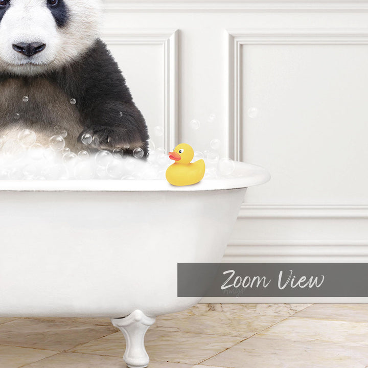 A panda sitting in a bathtub filled with bubbles, with a yellow rubber duck floating nearby.