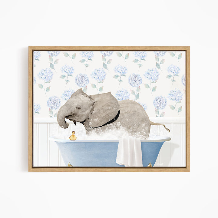 A gray elephant is taking a bath in a blue tub, surrounded by a floral patterned wall.