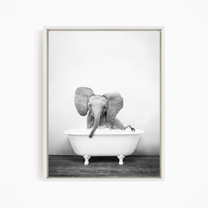 A baby elephant sitting in a bathtub filled with water, creating a whimsical and playful scene.