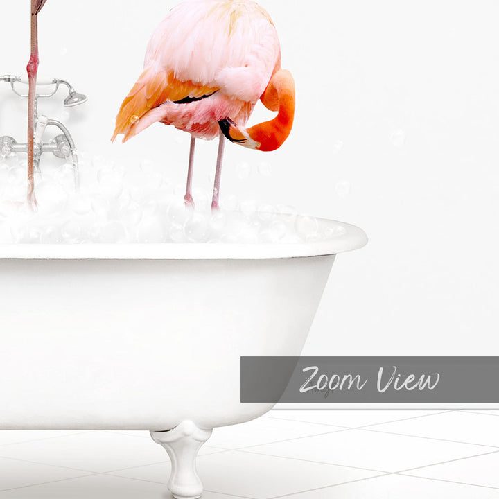 A pink flamingo standing in a white bathtub filled with water, with bubbles around it.