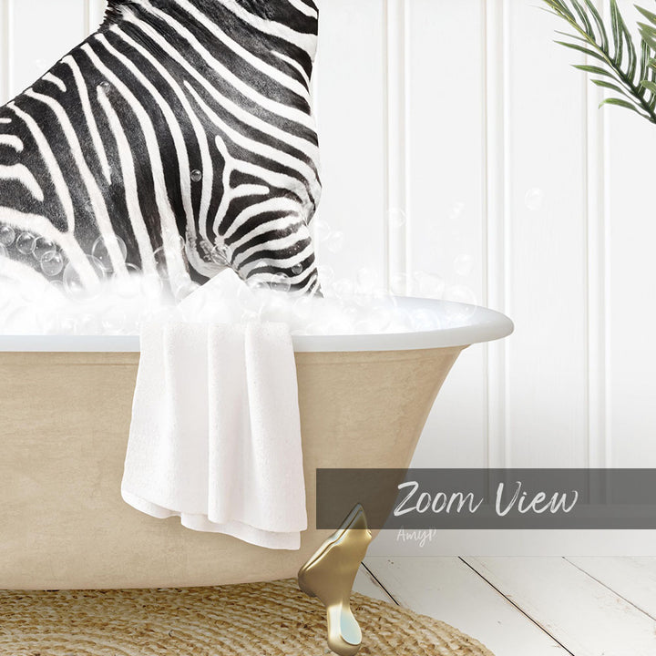 A zebra standing in a bathtub filled with water, with a towel hanging on the side and a plant visible in the background.