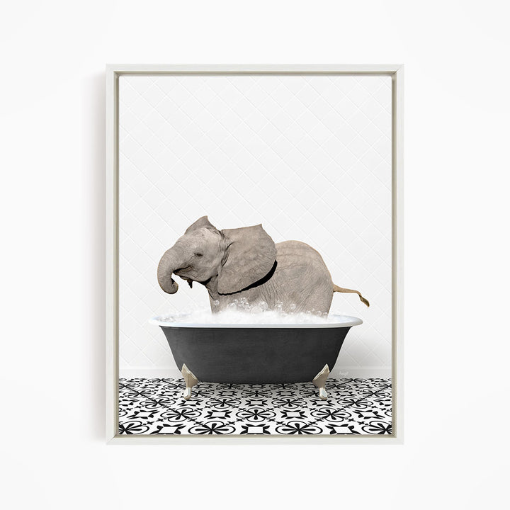 A gray elephant is sitting in a black bathtub filled with water, creating a whimsical and playful scene.