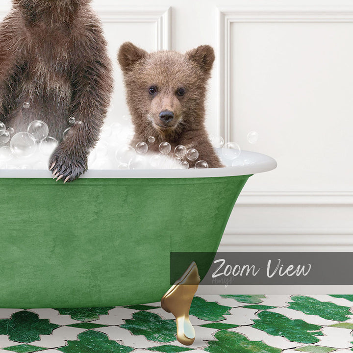 A young bear cub sitting in a green bathtub filled with bubbles, with a text overlay that reads "Zoom View".
