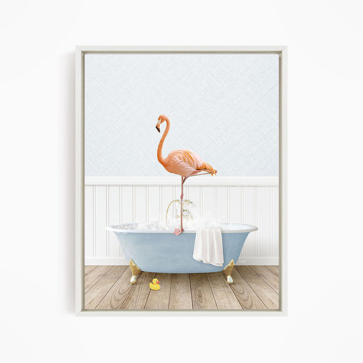 A pink flamingo stands on the edge of a blue bathtub filled with water, with a yellow rubber duck floating in the tub.