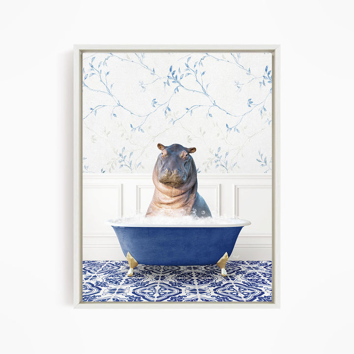 A hippopotamus sitting in a blue bathtub filled with water, surrounded by a patterned tile floor and a floral wallpaper background.