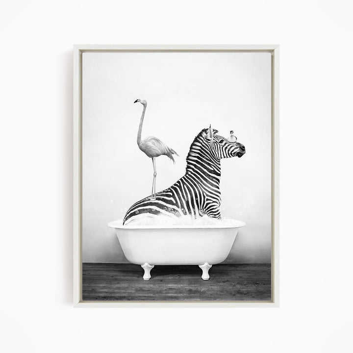A zebra is sitting in a bathtub, with a flamingo standing on its back legs and a bird perched on its head.