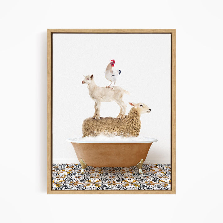 A framed image depicting a sheep standing on a chicken's back, with a rooster perched on top of the sheep, all in a bathtub filled with bubbles.