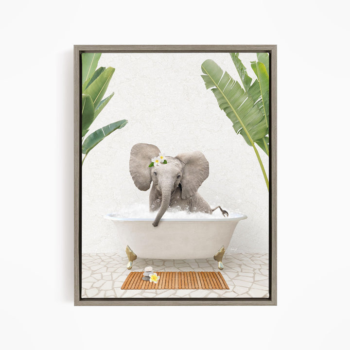 A gray elephant is sitting in a white bathtub, surrounded by green leaves and a wooden mat, creating a whimsical and playful scene.