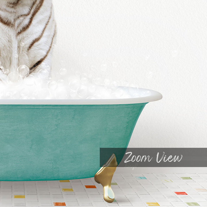 A white cat is standing in a green bathtub filled with bubbles, with a gold bathtub stopper visible.