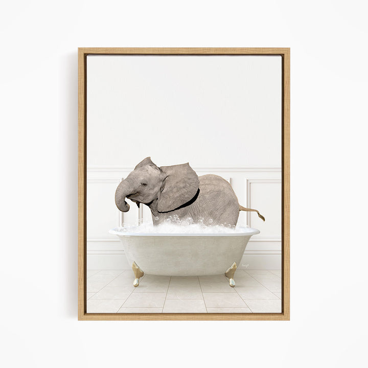 A gray elephant is sitting in a white bathtub filled with water, creating a whimsical and playful scene.