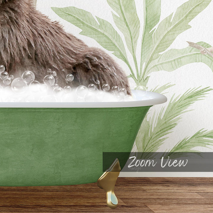 A brown dog is sitting in a green bathtub filled with bubbles, with a palm tree wallpaper in the background.
