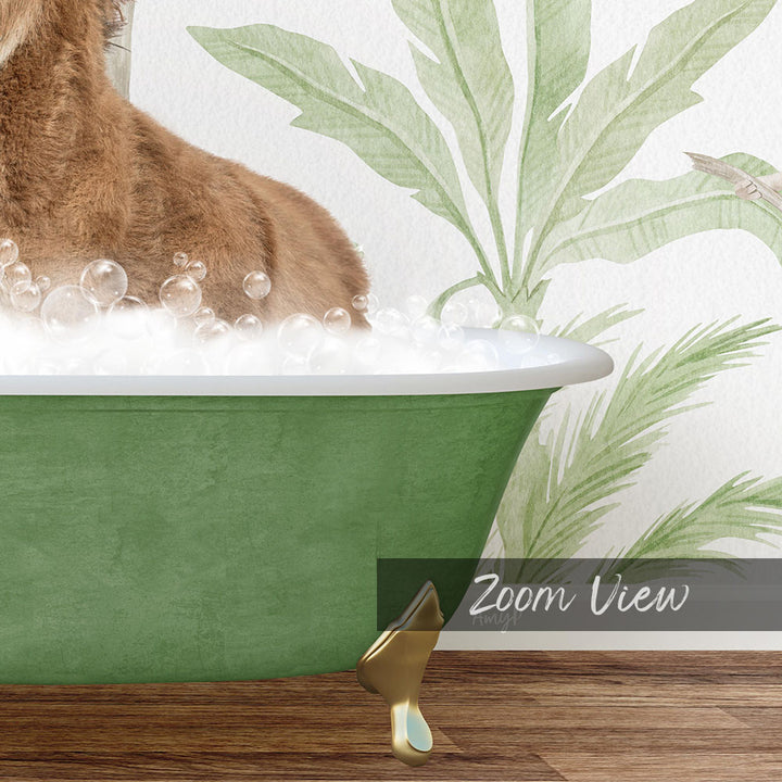 A brown cat sitting in a green bathtub filled with bubbles, with a palm tree wallpaper in the background.