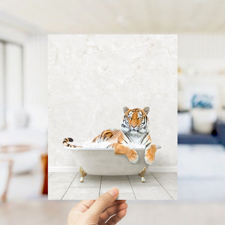 A tiger is sitting in a bathtub, appearing relaxed and comfortable.
