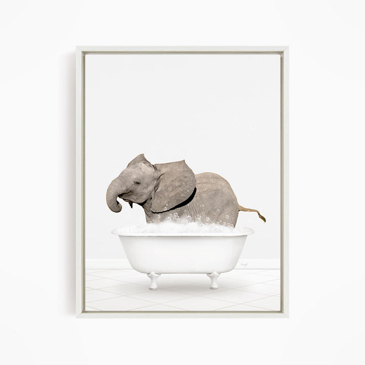 A baby elephant standing in a white bathtub filled with water, creating a playful and whimsical scene.
