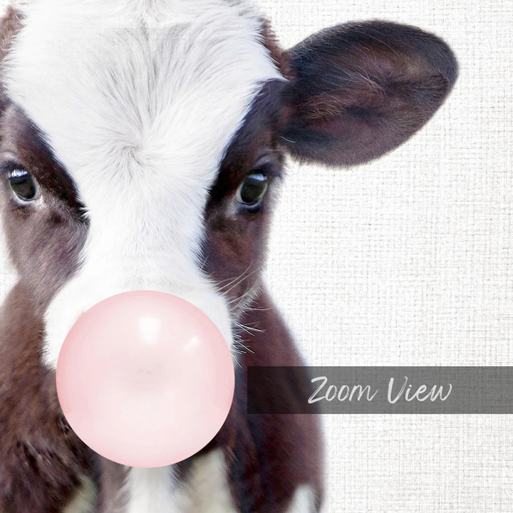 A close-up of a cow's face with its nose in a pink bubble, accompanied by the text "Zoom View".