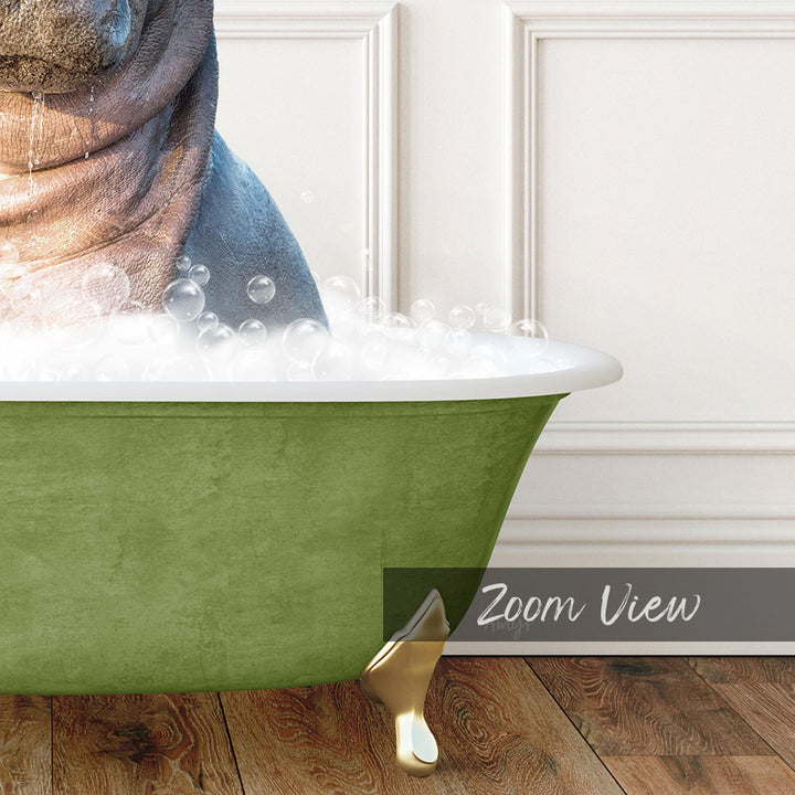 A green bathtub filled with bubbles, with a gold claw-like object resting on the side of the tub.