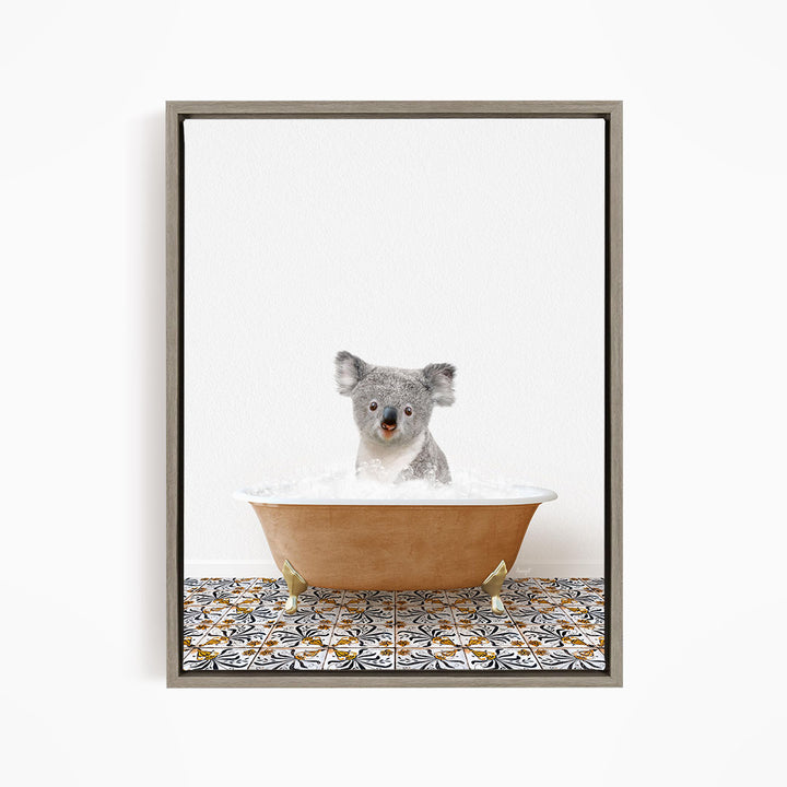 A koala bear sitting in a bathtub filled with water, surrounded by a patterned tile floor.