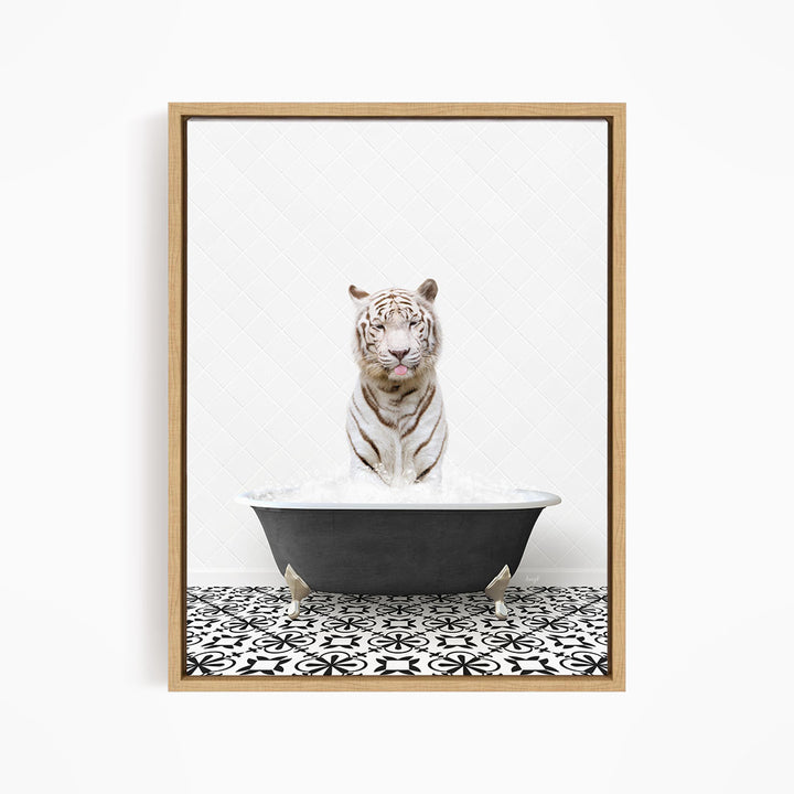 A white tiger sitting in a black bathtub filled with water, surrounded by a black and white patterned floor.