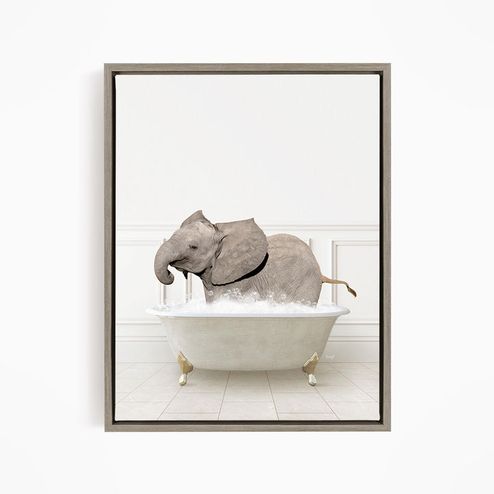 A gray elephant is sitting in a white bathtub filled with water, creating a whimsical and playful scene.