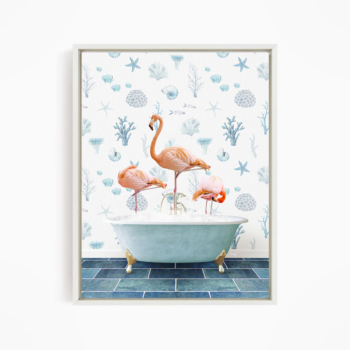 A framed image depicting three flamingos standing in a bathtub filled with bubbles, surrounded by a blue and white floral pattern.