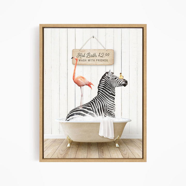 A framed image depicting a zebra sitting in a bathtub, with a pink flamingo standing on its back and a sign above the bathtub that reads "Hot Bath with Friends".