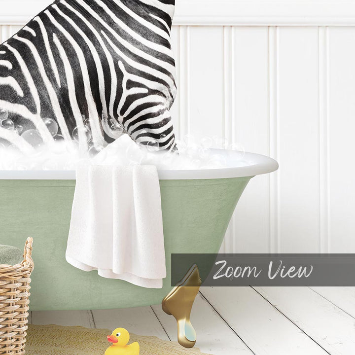 A zebra standing in a green bathtub filled with water, surrounded by a yellow rubber duck and a white towel.