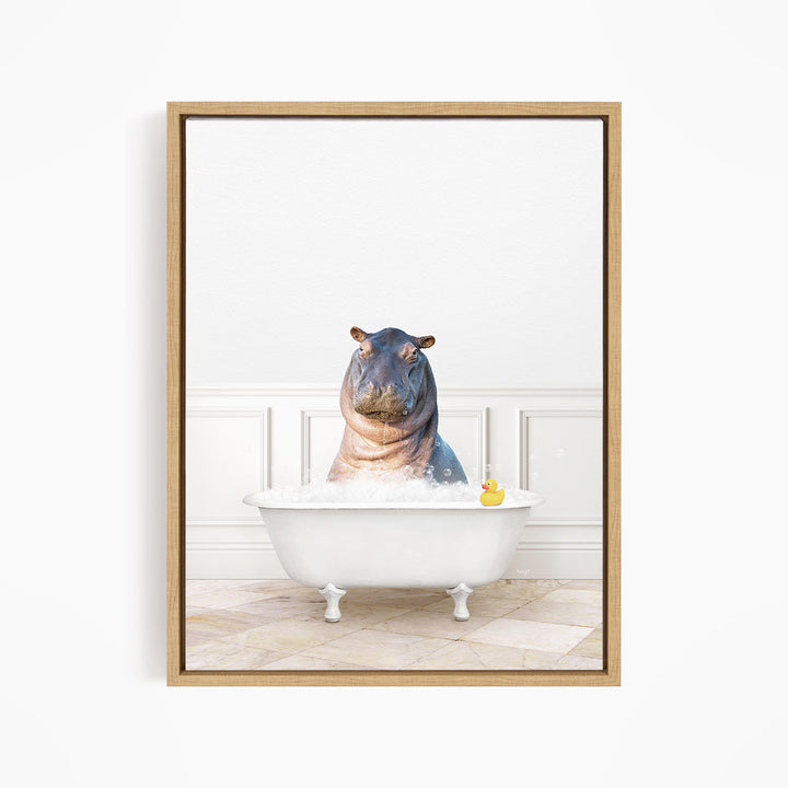 A hippopotamus sitting in a white bathtub, with a rubber duck floating in the water.