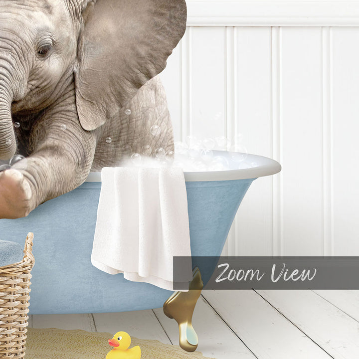 A baby elephant sitting in a blue bathtub, surrounded by a yellow rubber duck and a towel, with a white wall in the background.