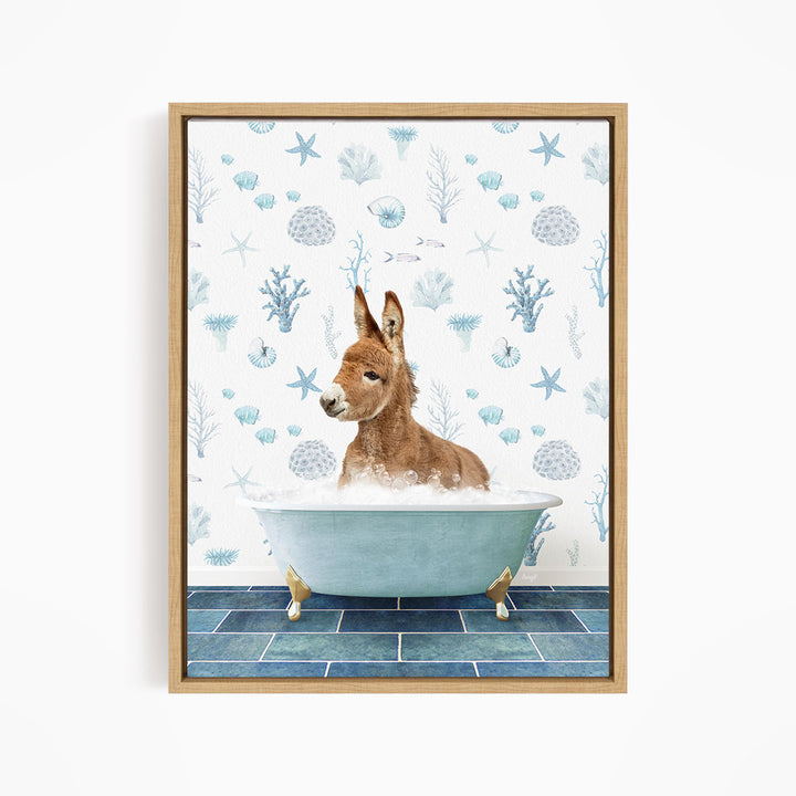 A donkey is sitting in a blue bathtub filled with bubbles, surrounded by a pattern of seashells, starfish, and other marine life.