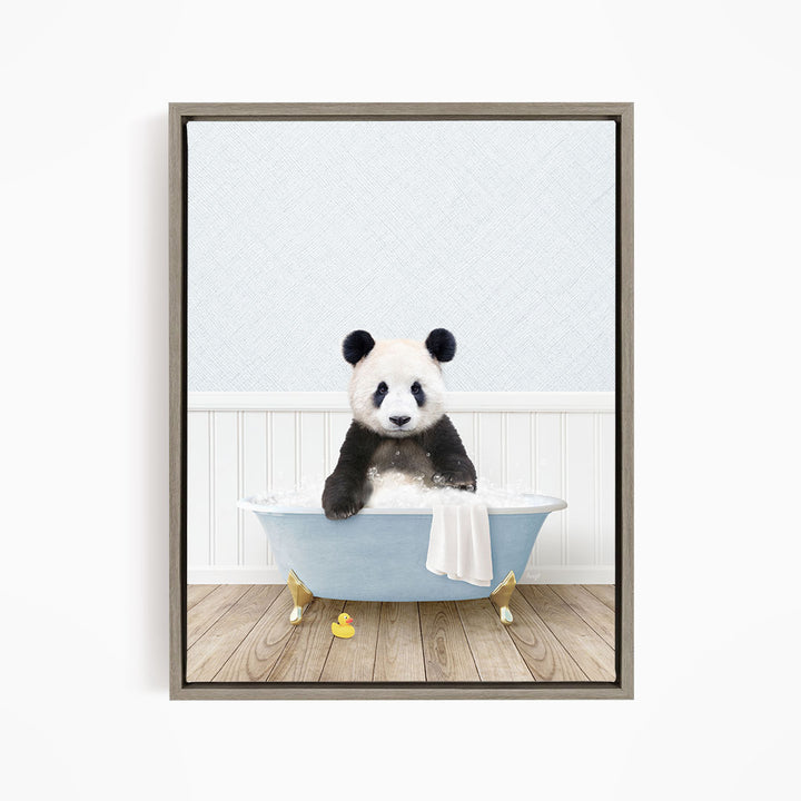 A panda bear sitting in a blue bathtub filled with water, surrounded by rubber ducks.