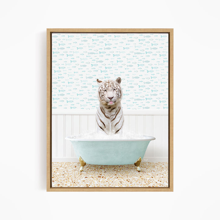 A white tiger is sitting in a light blue bathtub filled with water, surrounded by a pattern of small fish.