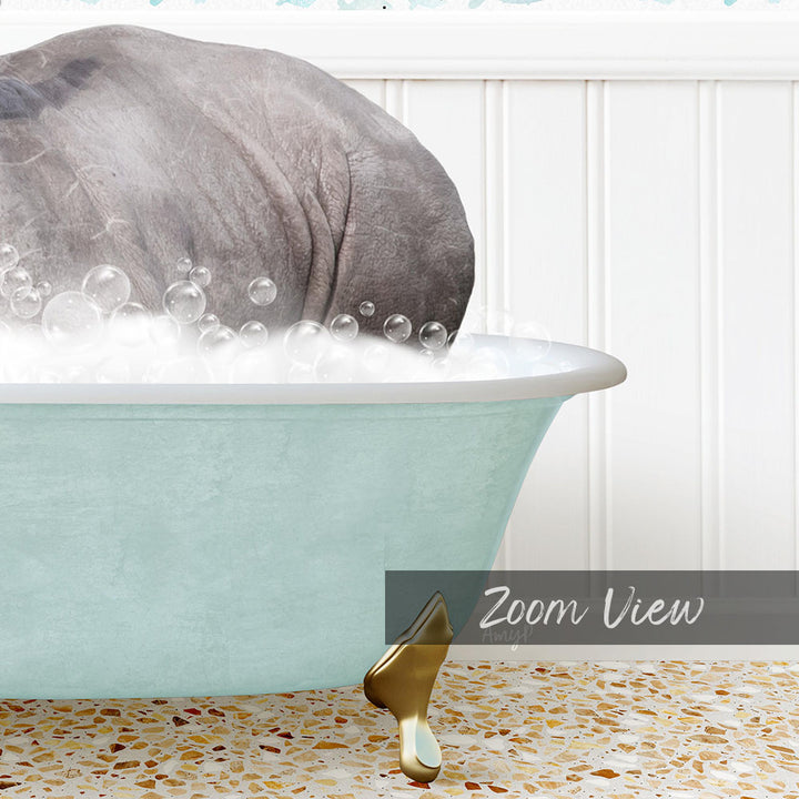 A large gray rhinoceros is sitting in a light blue bathtub filled with bubbles, with a gold bathtub leg visible on the floor.