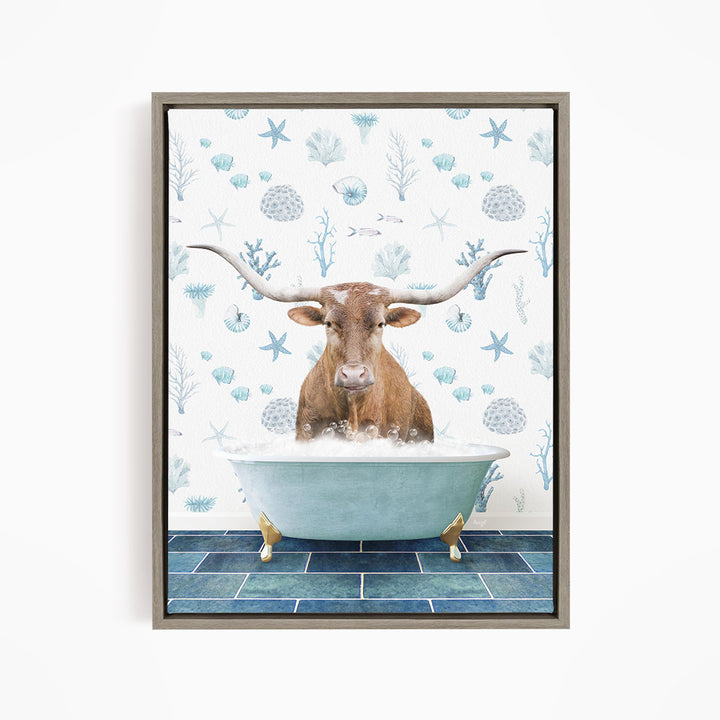 A bull with large horns is sitting in a blue bathtub filled with bubbles, surrounded by a pattern of seashells and starfish.