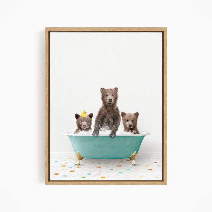 A framed image depicting three bears sitting in a bathtub filled with water, with one bear sitting in the center and two bears sitting on either side.