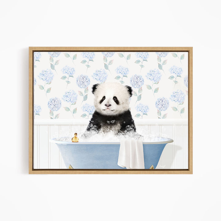 A panda bear sitting in a blue bathtub, surrounded by blue flowers on the wall.