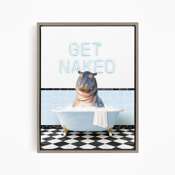 A framed image depicting a hippopotamus sitting in a bathtub with the text "GET NAKED" displayed above it.