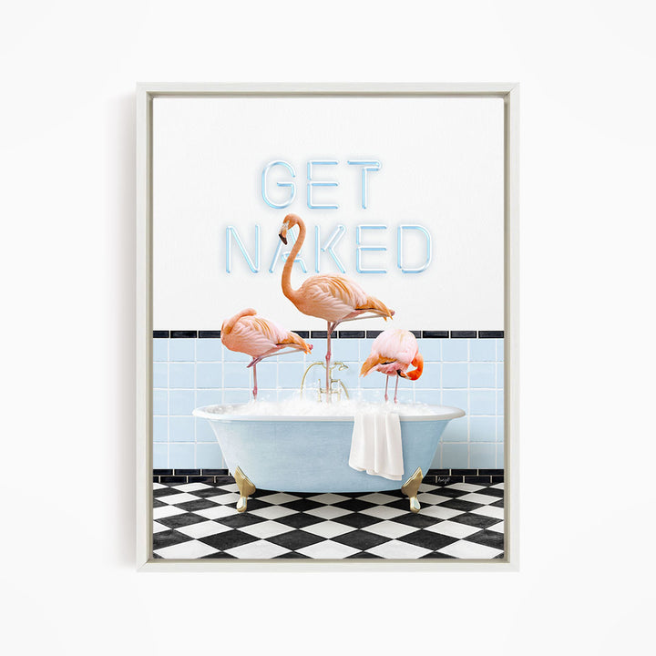 A framed image depicting three flamingos standing in a bathtub, with the text "GET NAKED" displayed above them.
