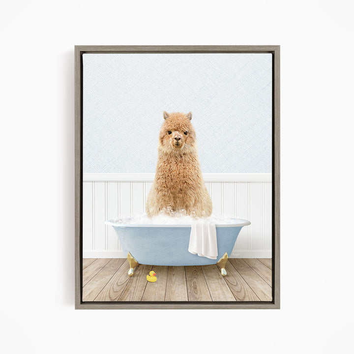 A fluffy brown dog sitting in a blue bathtub filled with bubbles, with a yellow rubber duck floating nearby.