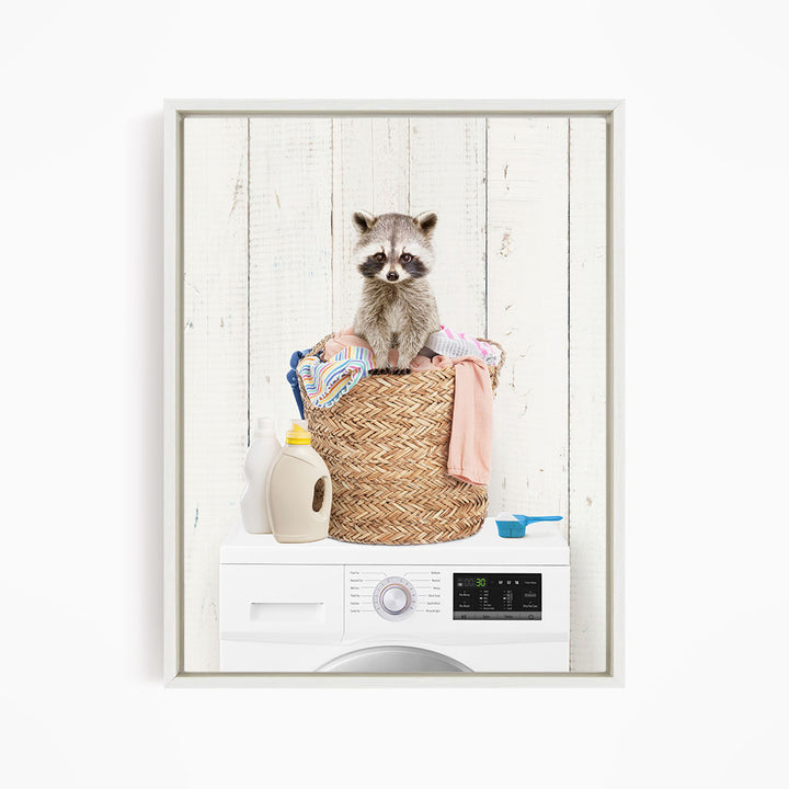 A raccoon sitting in a woven laundry basket on top of a washing machine.